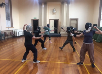 image: A fencing class at Stoccata